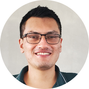 Jose Ruiz Munoz profile photo - smiling man with glasses wearing a dark polo shirt